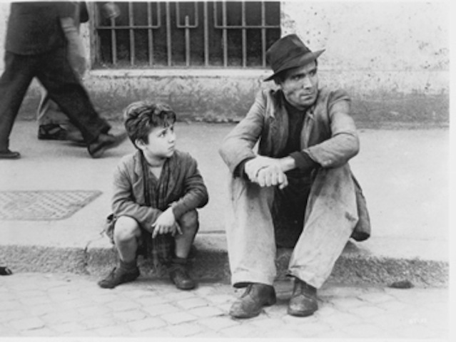 Still of Lamberto Maggiorani and Enzo Staiola in Ladri di biciclette (1948)