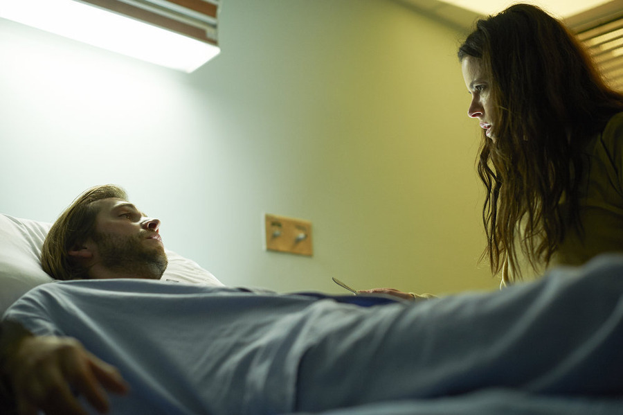 Still of Emily Hampshire and Aaron Stanford in 12 Monkeys (2015)