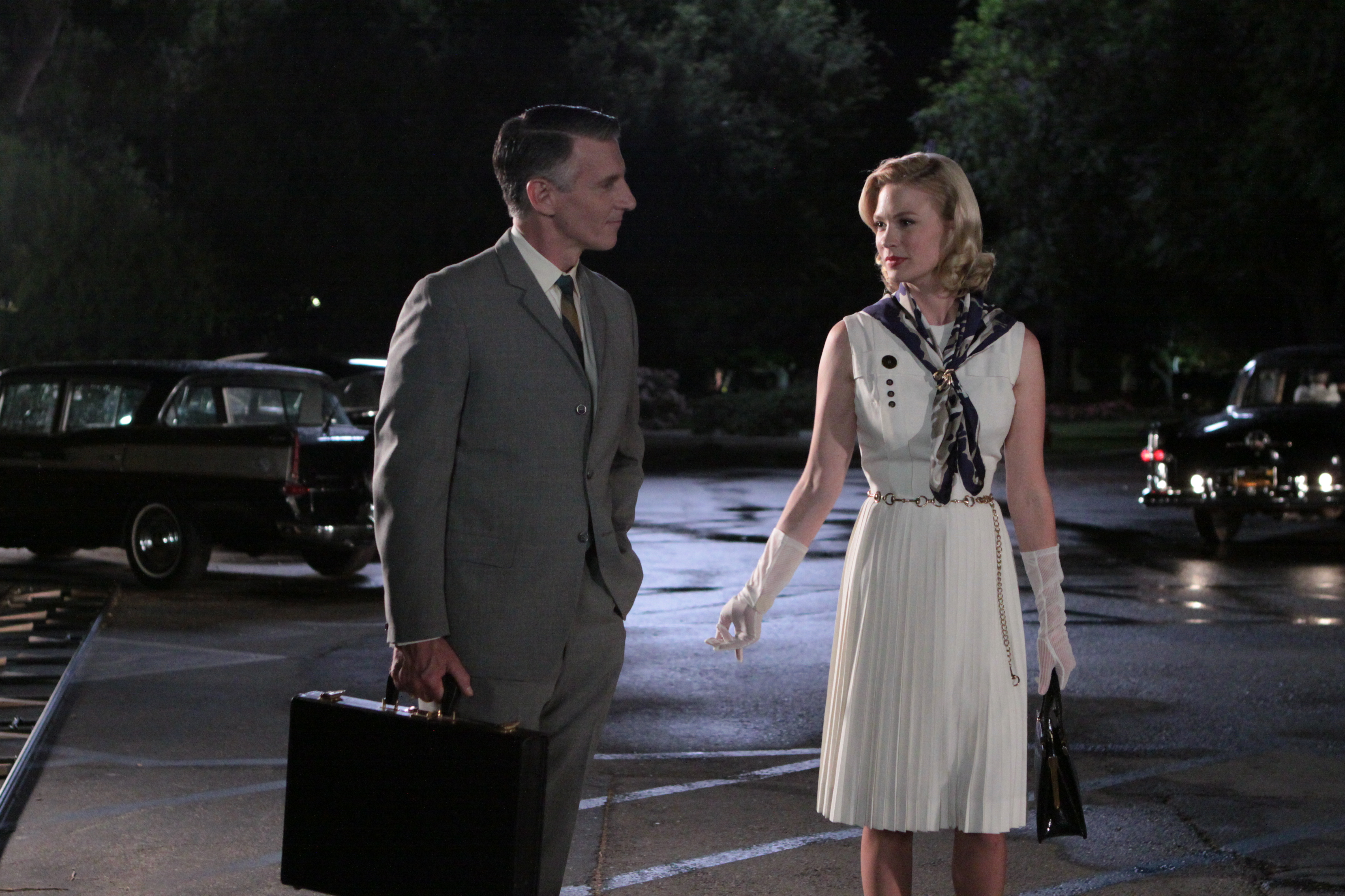 Christopher Stanley as Henry Francis and January Jones as Betty Draper. 