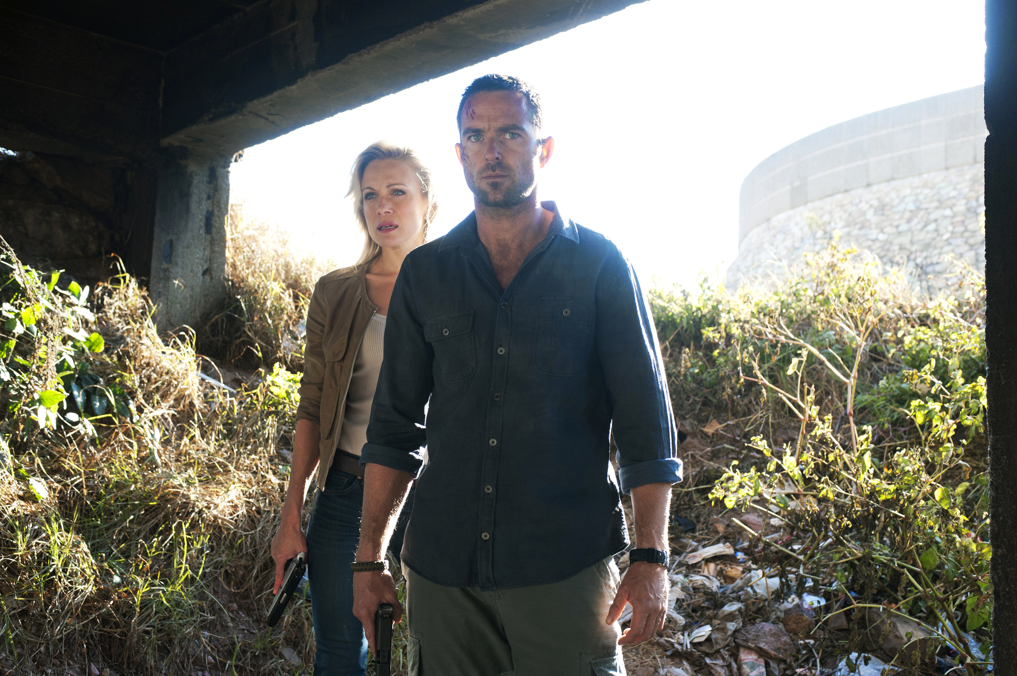 Still of Sullivan Stapleton and Stephanie Vogt in Strike Back (2010)