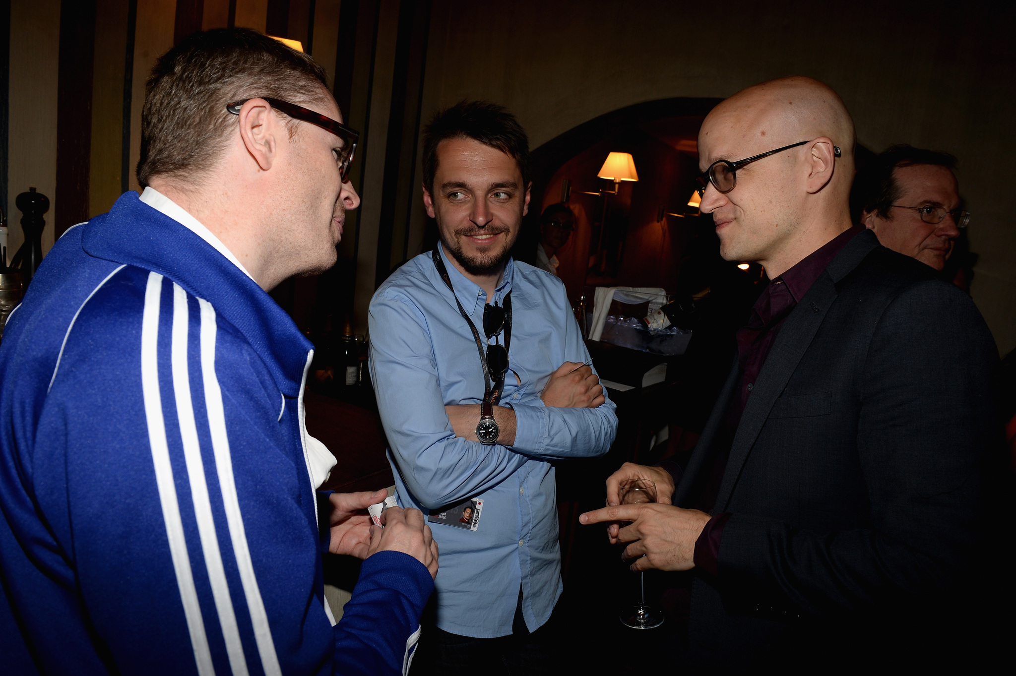 Director Nicolas Winding Refn (L), Jacob Jarek and guest attend the IMDB's 2013 Cannes Film Festival Dinner Party during the 66th Annual Cannes Film Festival at Restaurant Mantel on May 20, 2013 in Cannes, France.