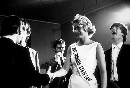 The Beatles (Ringo Starr, George Harrison, John Lennon) meeting Miss Indiana State Fair, Indianapolis, 1964
