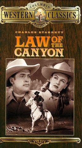 Nancy Saunders and Charles Starrett in Law of the Canyon (1947)