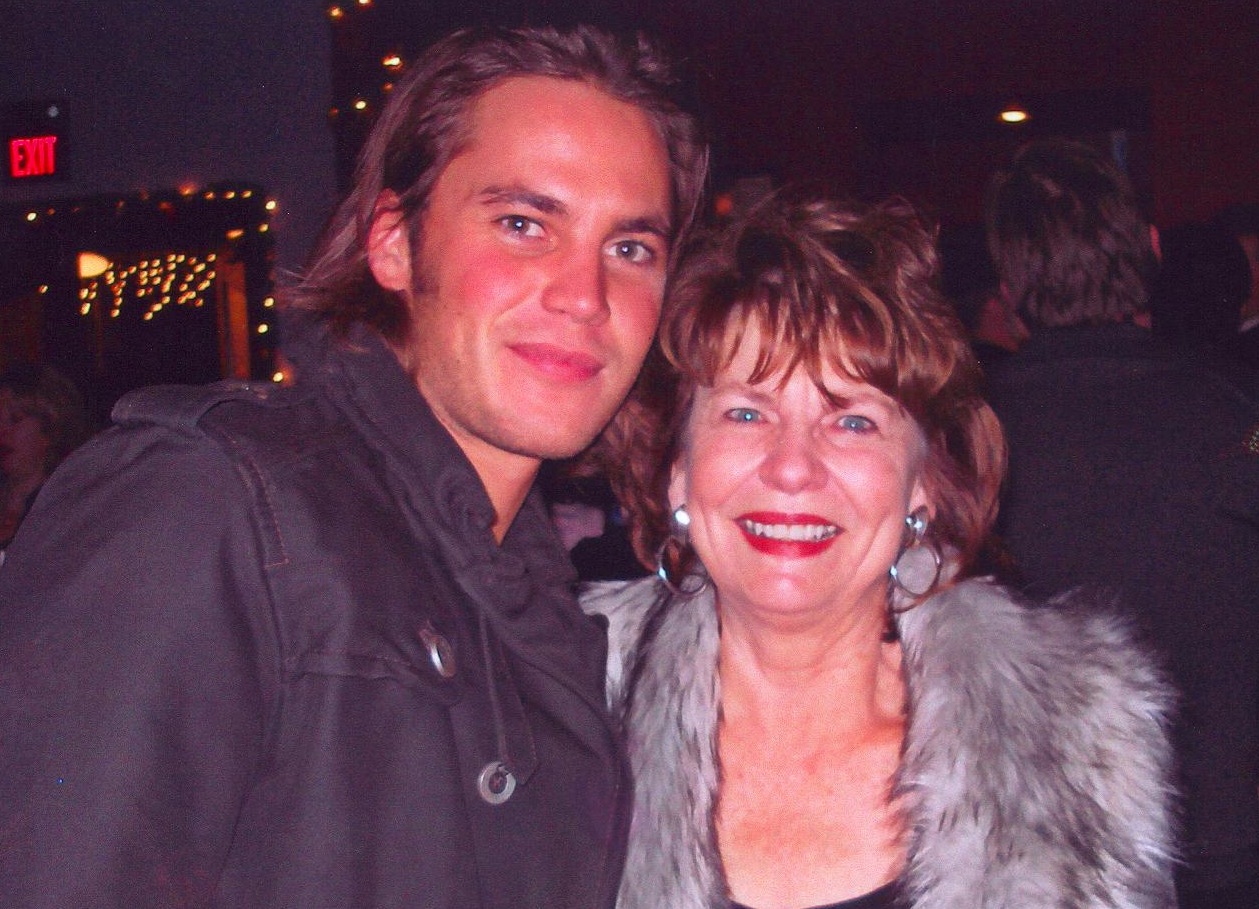 With actor Taylor Kitsch at a cast party for FRIDAY NIGHT LIGHTS.