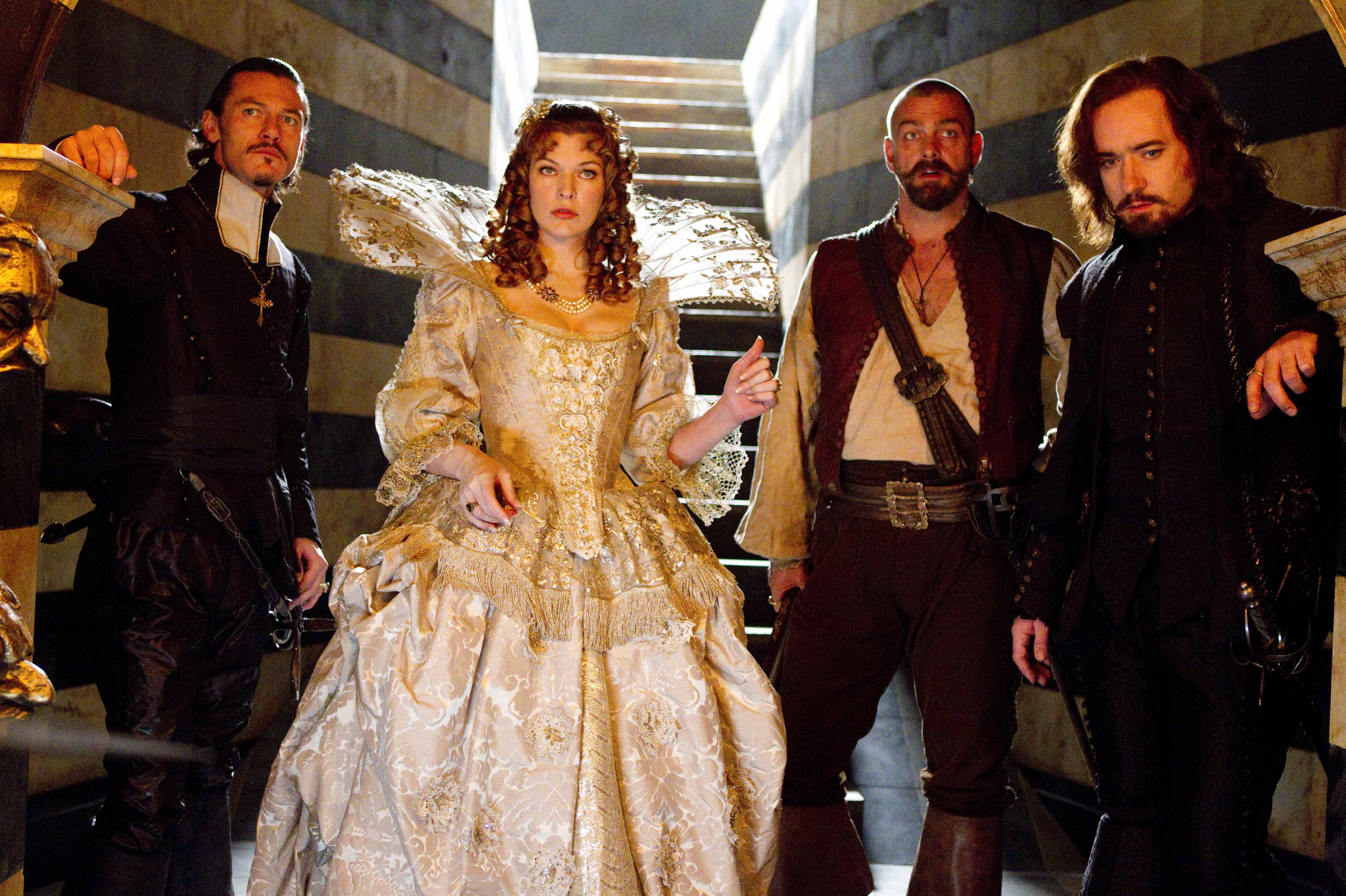 Still of Milla Jovovich, Matthew Macfadyen, Ray Stevenson and Luke Evans in Trys muskietininkai 3D (2011)