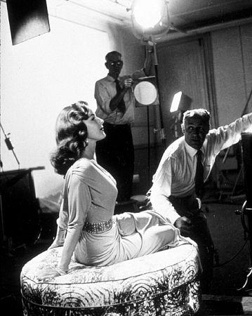 Elaine Stewart being photographed by Ray Jones, 1953.