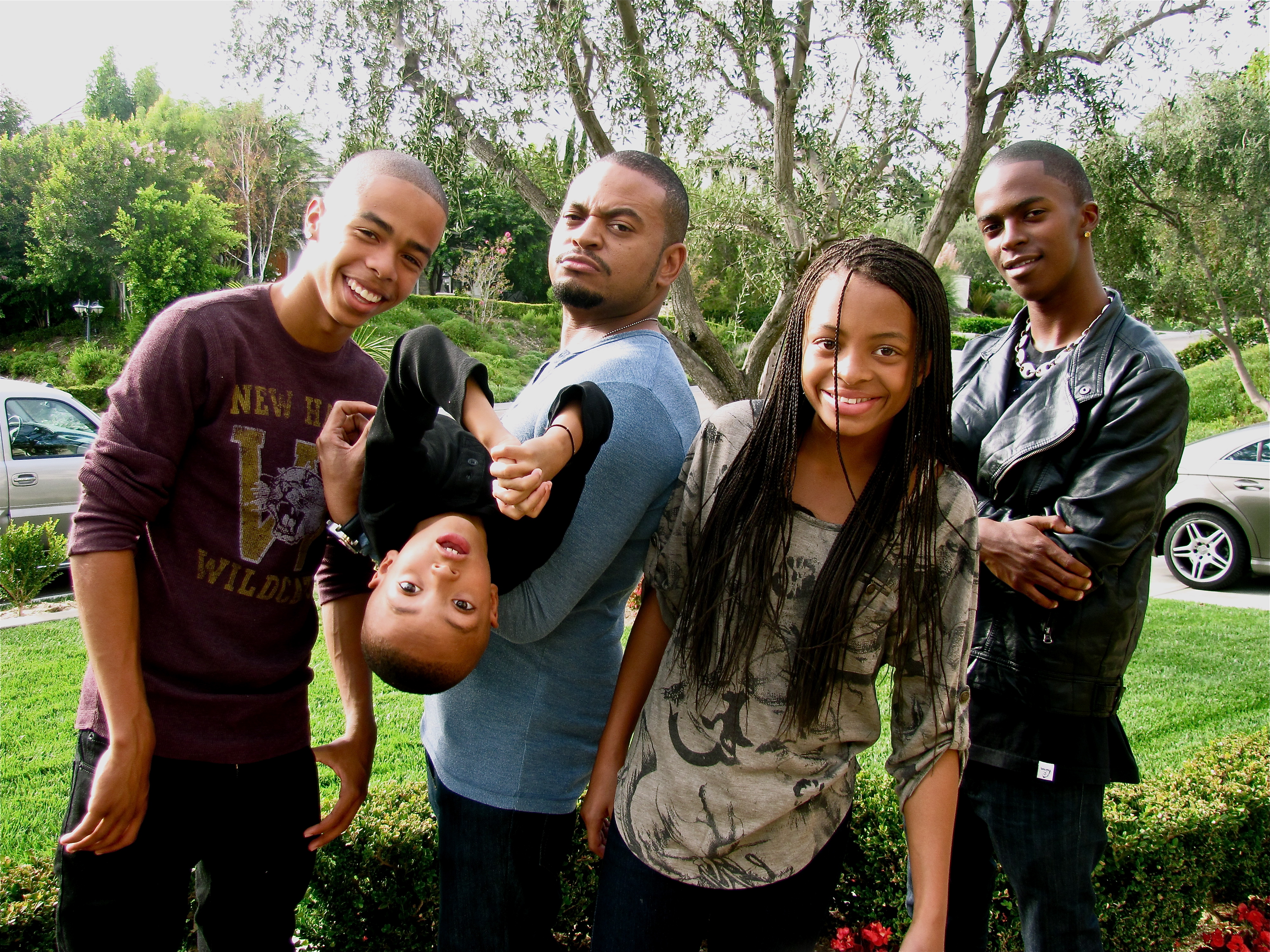 Chris Stokes with his four children. From left Miko, Stinky, Chris Stokes, Chrissy and Milo.