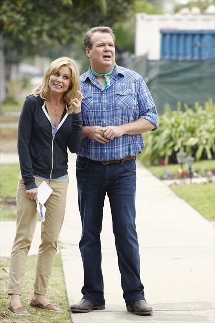 Still of Julie Bowen and Eric Stonestreet in Moderni seima (2009)