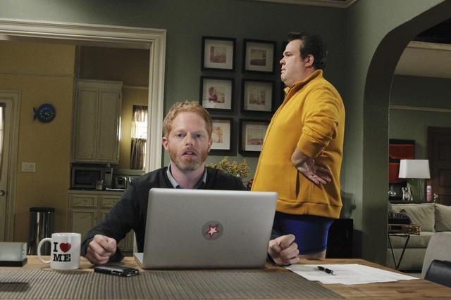 Still of Jesse Tyler Ferguson and Eric Stonestreet in Moderni seima (2009)