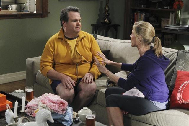 Still of Julie Bowen and Eric Stonestreet in Moderni seima (2009)