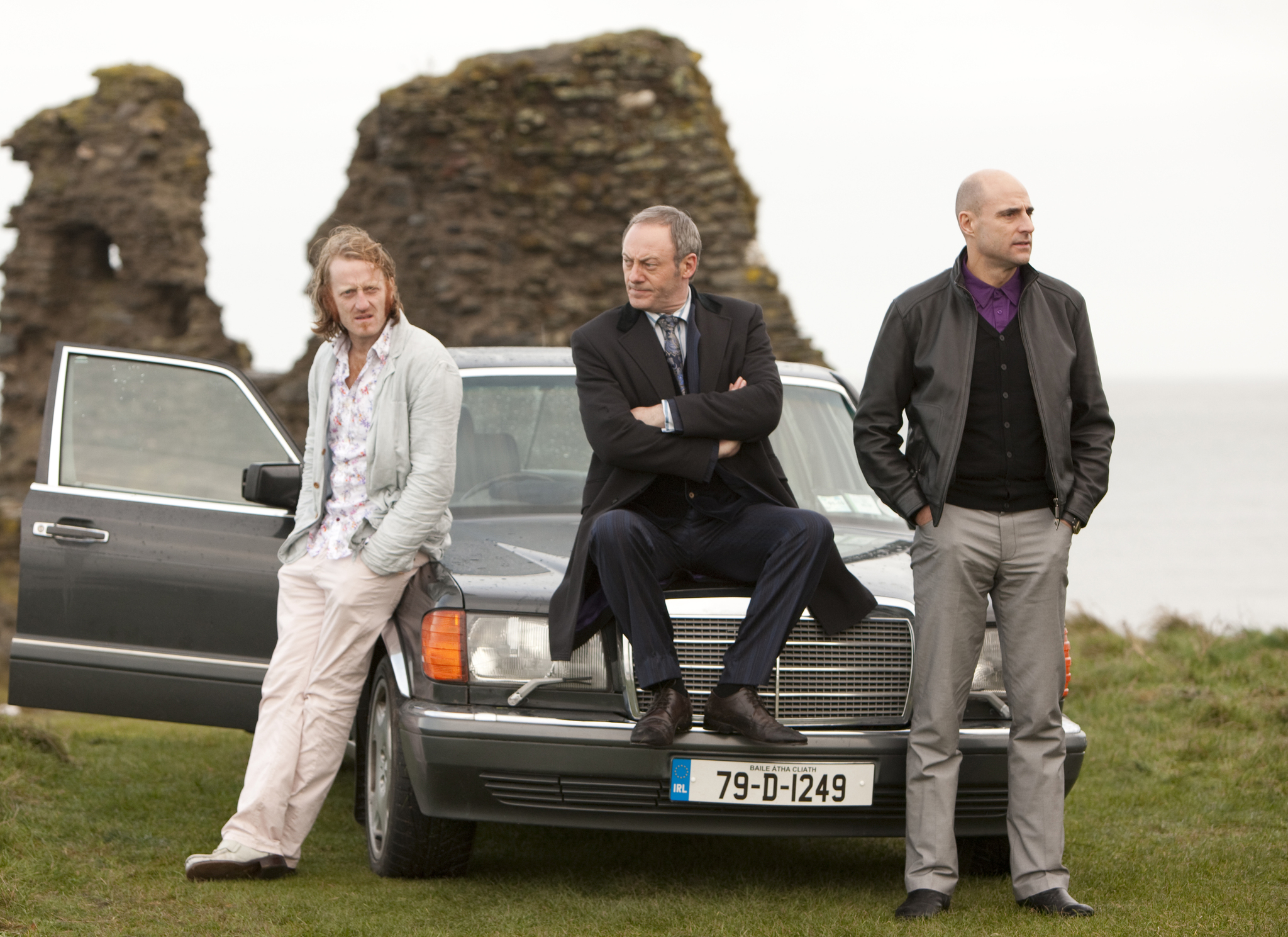 Still of Liam Cunningham, Mark Strong and David Wilmot in The Guard (2011)