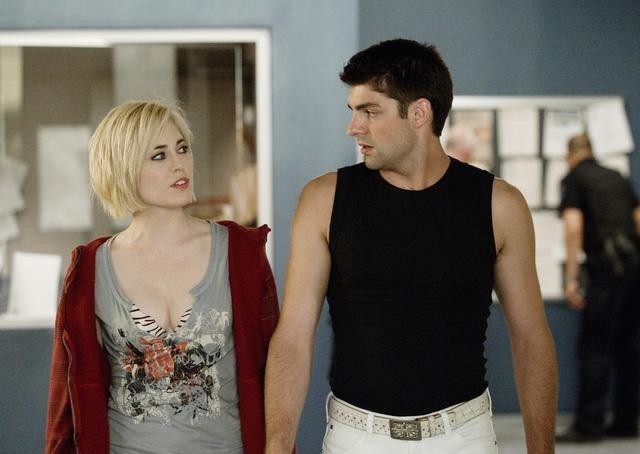 Still of Charlotte Sullivan and Travis Milne in Rookie Blue (2010)