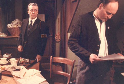 Chris Sullivan (I) (left) with Lloyd McGuire in Nine Days in May (1984) (TV)|