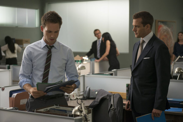 Still of Gabriel Macht and Patrick J. Adams in Suits (2011)