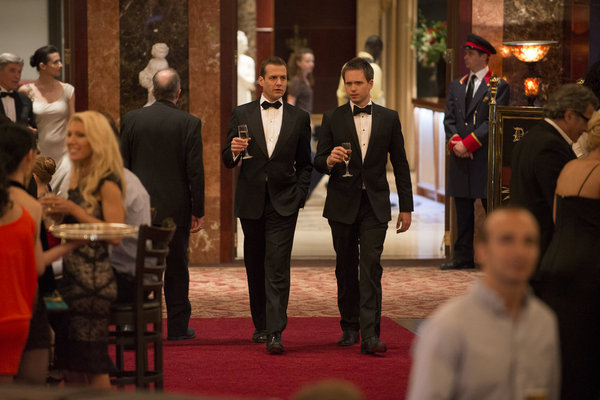 Still of Gabriel Macht and Patrick J. Adams in Suits (2011)