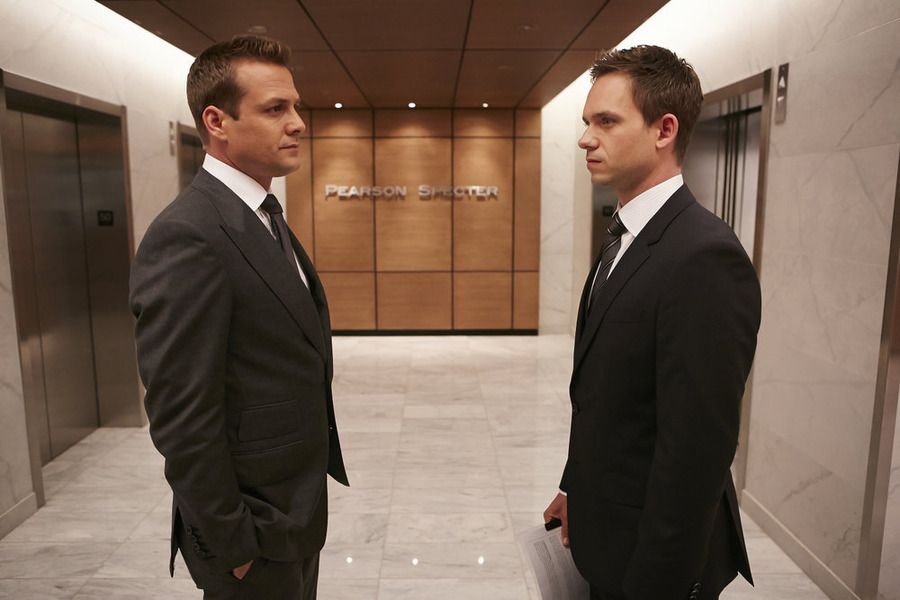 Still of Gabriel Macht and Patrick J. Adams in Suits (2011)