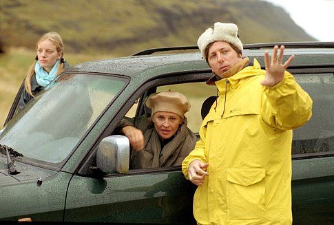 SARAH POLLEY, JULIE CHRISTIE, and director HAL HARTLEY on the set of the satiric fable NO SUCH THING (from United Artists with American Zoetrope).