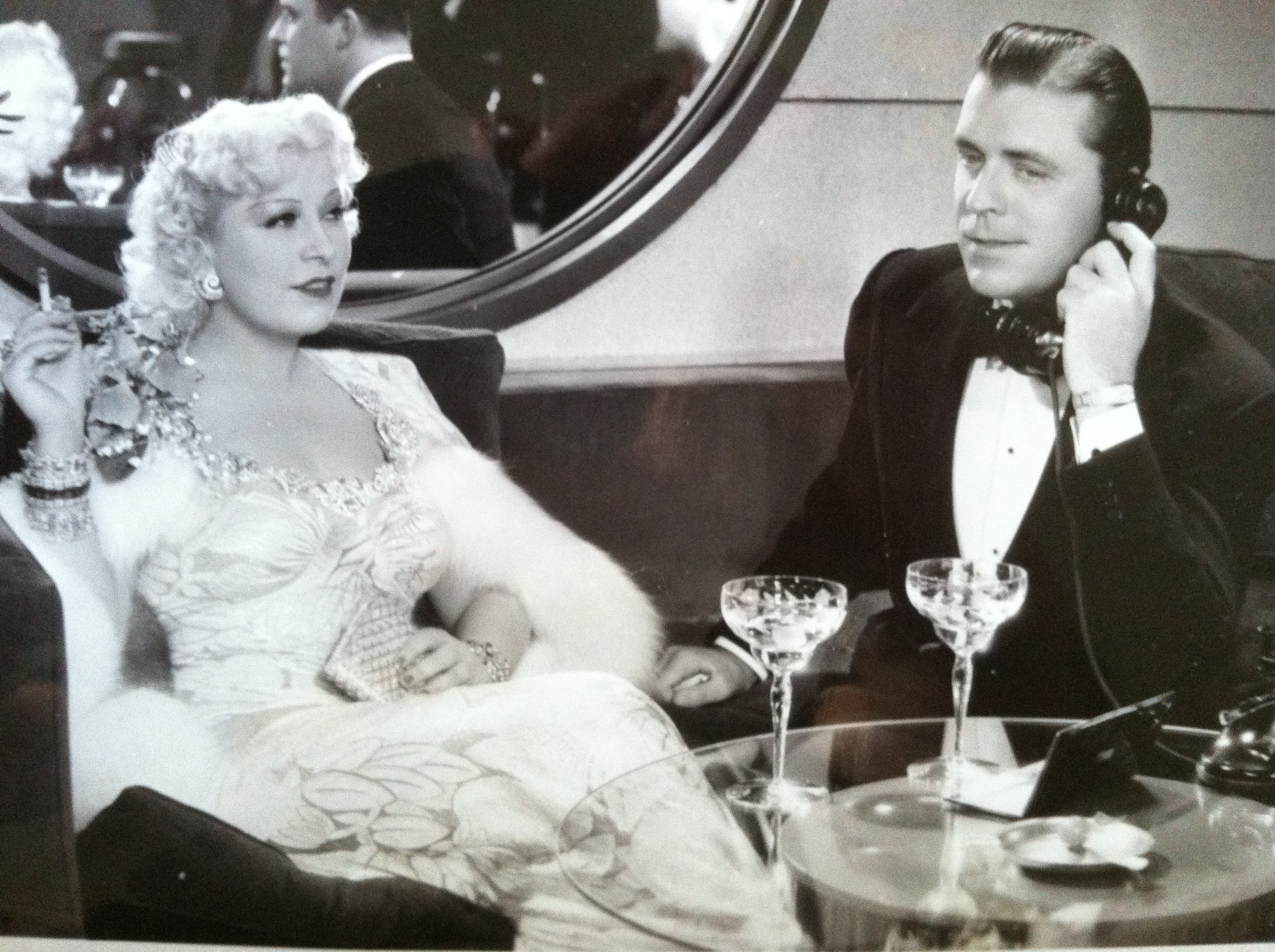 Mae West and Lyle Talbot in a scene from 