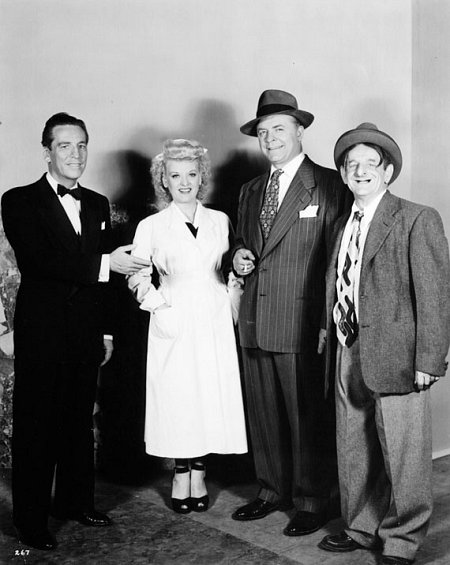 From left to right: Eddie Garr, Jean Carroll, Lyle Talbot and Harry Rose.