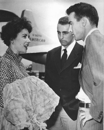 Elizabeth Taylor, brother Howard Taylor, and co-star Montgomery Clift at Idelwild Airport