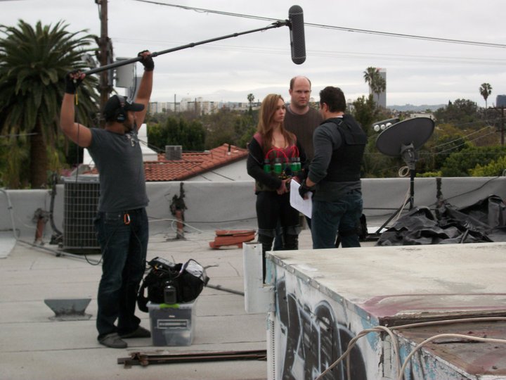 Jennifer Field, Andrew Thacher, and Hector Luis Bustamante on the set of Caribe Road