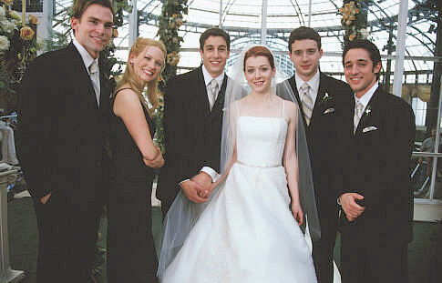(L to R) The bridal party: SEANN WILLIAM SCOTT as Steve Stifler, JANUARY JONES as Cadence, JASON BIGGS as Jim (the groom), ALYSON HANNIGAN as Michelle (the bride), EDDIE KAYE THOMAS as Finch and THOMAS IAN NICHOLAS as Kevin in American Wedding.