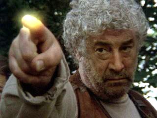 Gareth Thomas as Blaze unleases his power in David Winning's Merlin (1998/1) shot on location in Scotland.