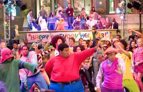 Fat Albert (Kenan Thompson, front, center) and friends wow partygoers with their dance moves.