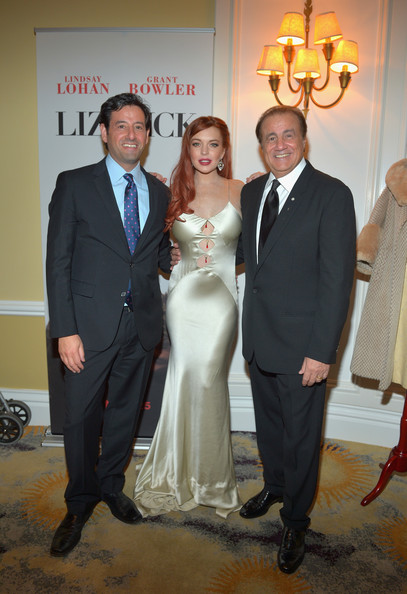 Rob Sharenow, Lindsay Lohan, and Larry A. Thompson at Lifetime 