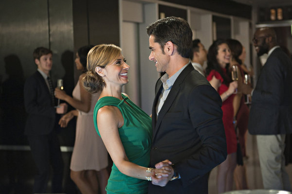 Still of John Stamos and Callie Thorne in Necessary Roughness (2011)