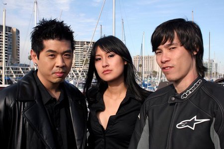 Jeff Lam, Kathy Uyen and Jason Tobin on the set of 