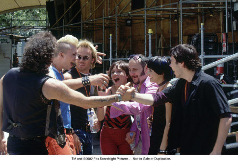 (Left to Right) Andy Anderson, Chris Sadrinna, Kick Gurry, Maya Stange, Russell Dykstra, Pia Miranda, and Brett Stiller in GARAGE DAYS.