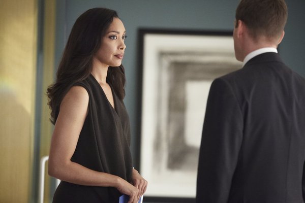 Still of Gabriel Macht and Gina Torres in Suits (2011)