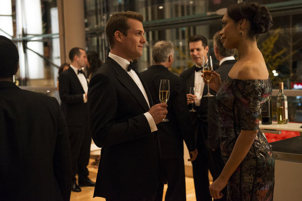 Still of Gabriel Macht and Gina Torres in Suits (2011)