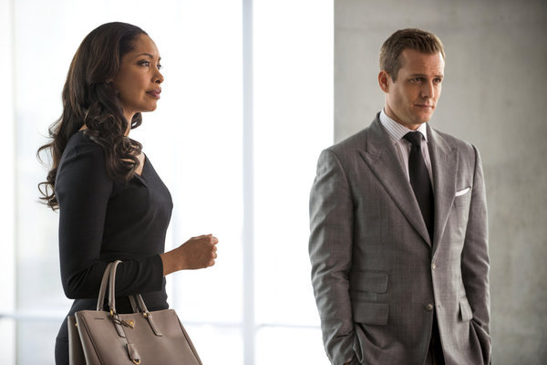 Still of Gabriel Macht, Gina Torres and Jessica Pearson in Suits (2011)