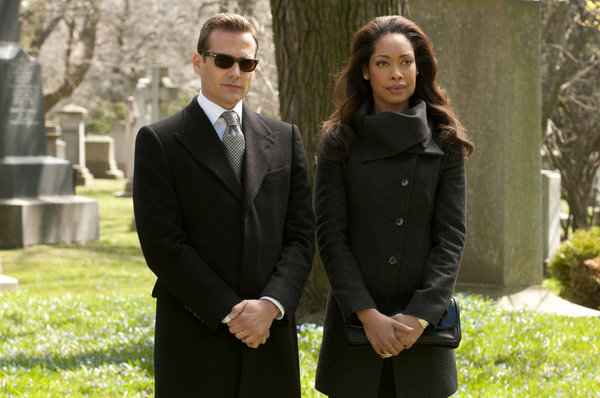 Still of Gabriel Macht and Gina Torres in Suits (2011)