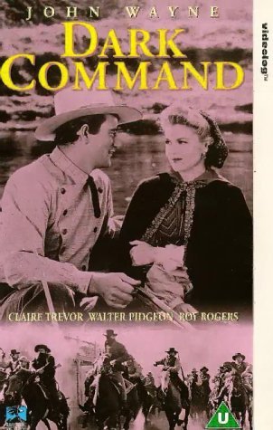 John Wayne and Claire Trevor in Dark Command (1940)
