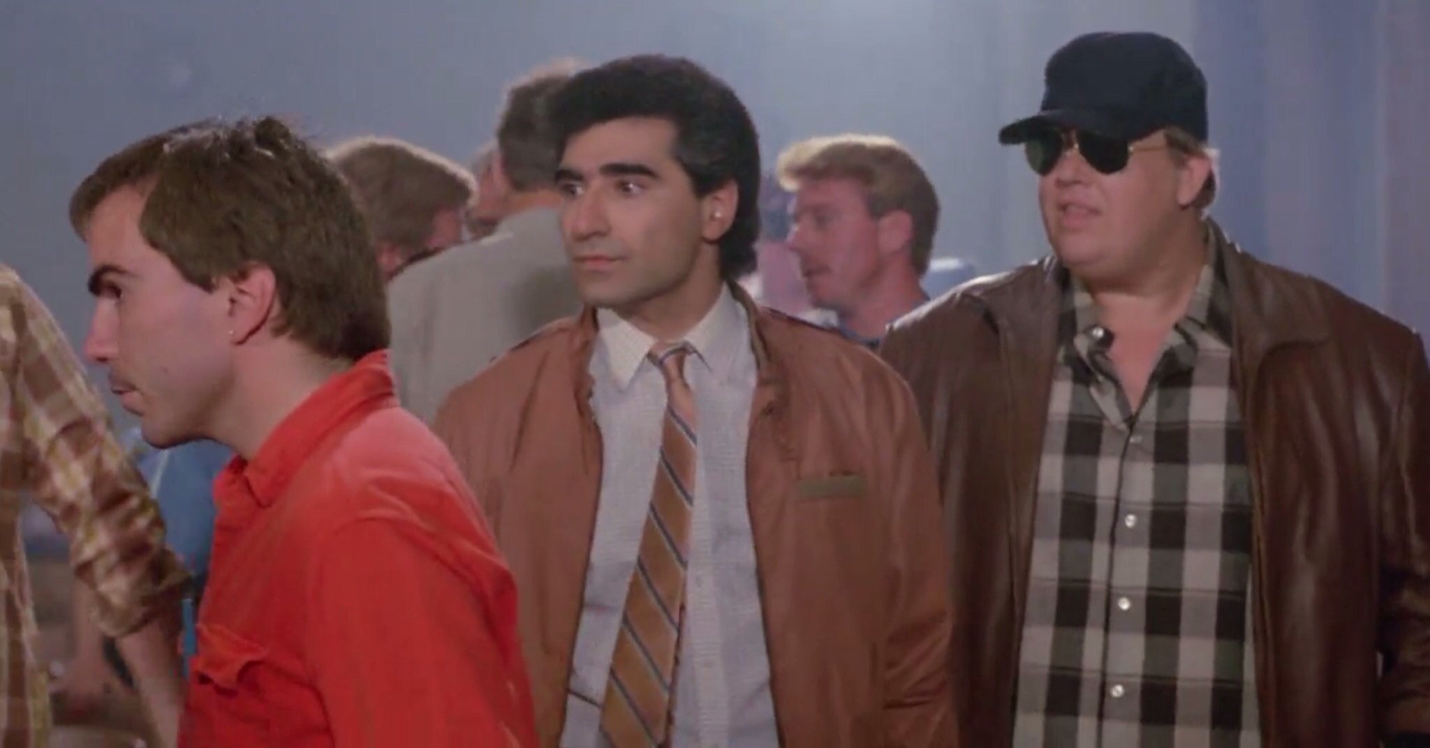 Still of Sydney Urshan, Eugene Levy and John Candy in Armed and Dangerous (1986)