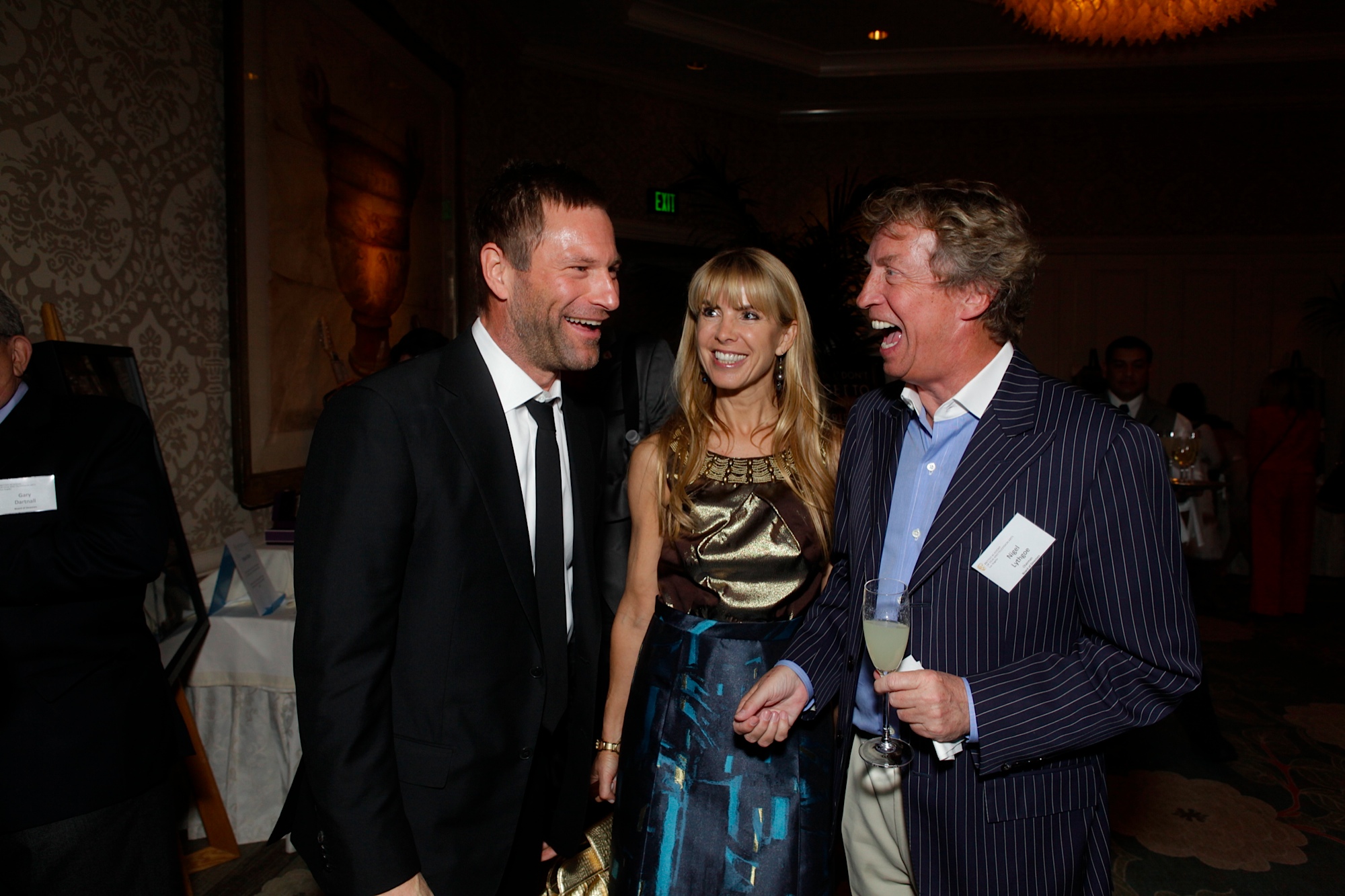 Julia Verdin with Aaron Eckhart and Nigel Lythgoe at the BAFTA Awards Season Tea Party