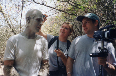 Brian Vermeire receives a touch-up & direction from Jennifer White and Nick Termini during the shooting of 