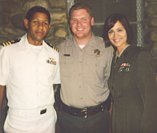 Adam Vernier, Catherine Bell and Scott Lawrence on the set of JAG.