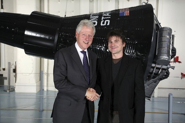 President Bill Clinton and actor Brian Vincent Kelly.