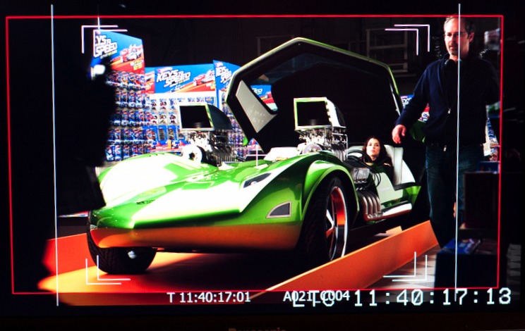 James Wahlberg preparing a scene with Danica Patrick.