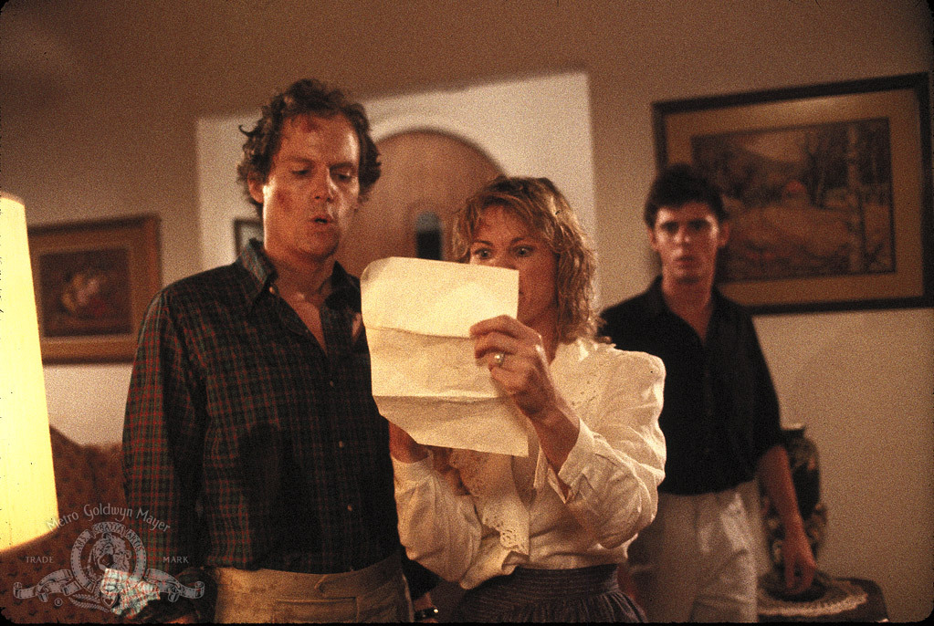 Still of C. Thomas Howell, Cliff De Young and Dee Wallace in Secret Admirer (1985)