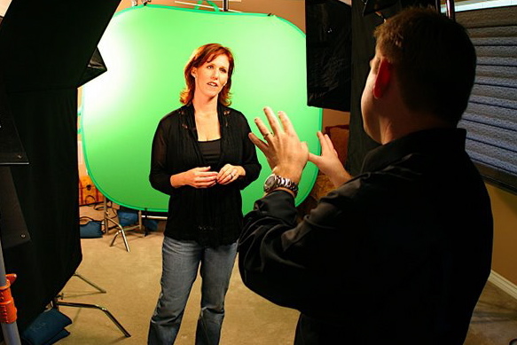 Matthew Warren directing Kathleen Herren during a commercial