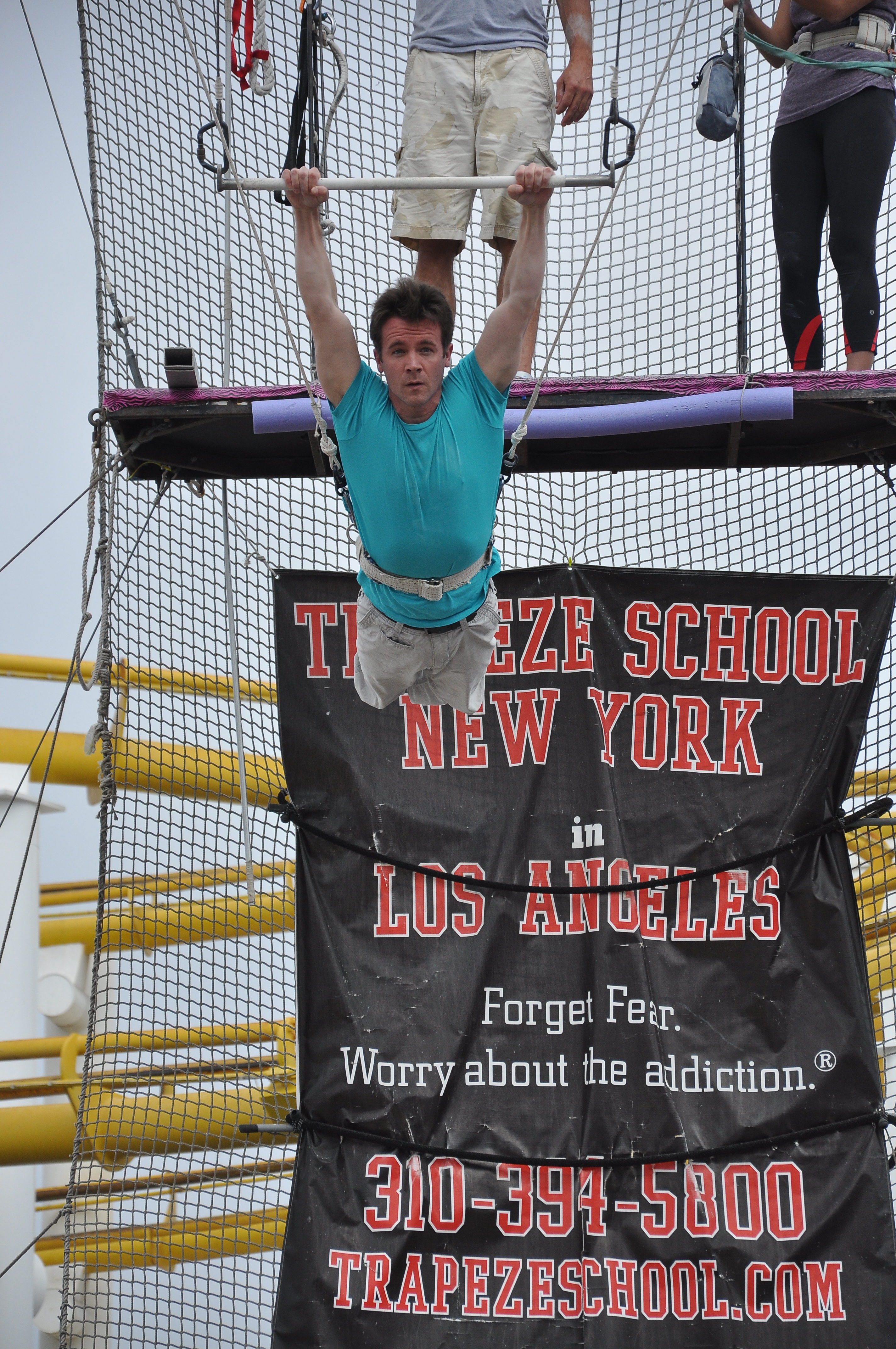 Craig Watkinson doing the flying trapeze in Santa Monica, CA, 2013.