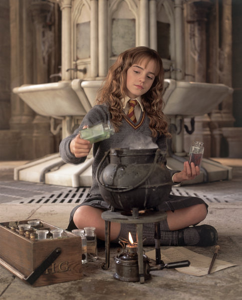 Hermione Granger (EMMA WATSON) mixes the polyjuice potion.