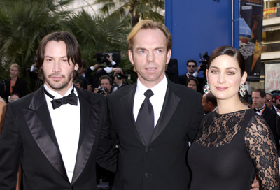 Keanu Reeves, Carrie-Anne Moss and Hugo Weaving at event of Matrica: Perkrauta (2003)