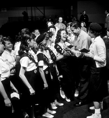 Lawrence Welk with a visiting Girl Scout troop, 1958.