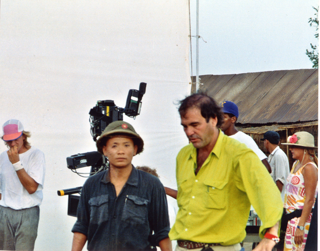 Last-minute direction from Director Oliver Stone on location shoot in Phuket, Thailand